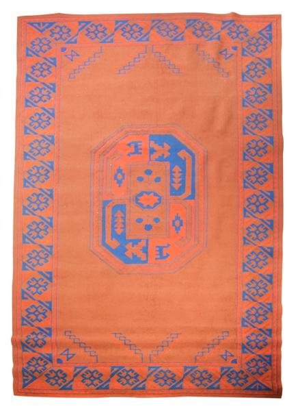 An Edward Fields Wool Rug, 16 feet 5 inches x 9 f: An Edward Fields Wool Rug, having orange field with blue geometric pattern. 16 feet 5 inches x 9 feet.