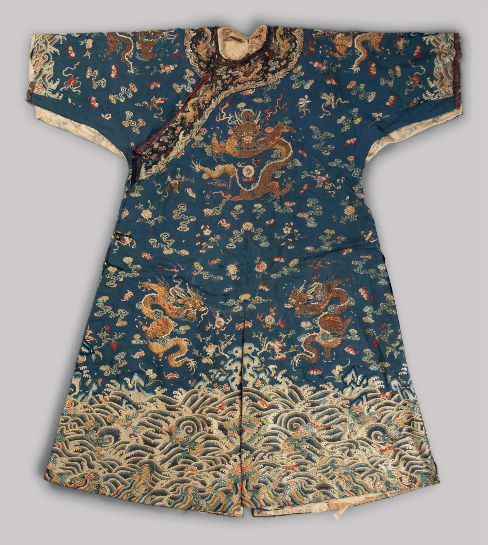 A Chinese Blue Ground Embroidered Silk Dragon Robe, (1 of 5)
