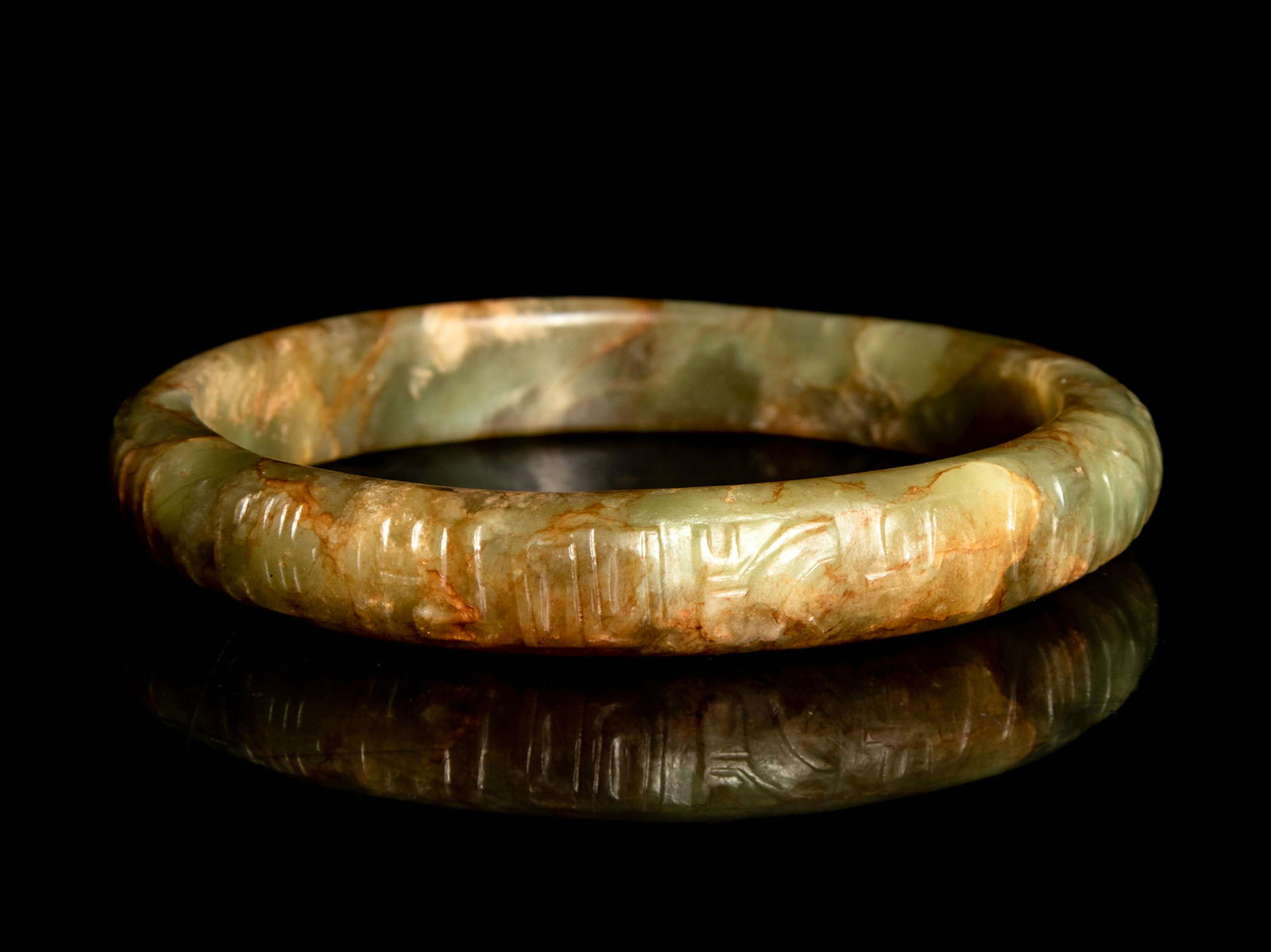 A Chinese Celadon Jade Bangle (1 of 2)