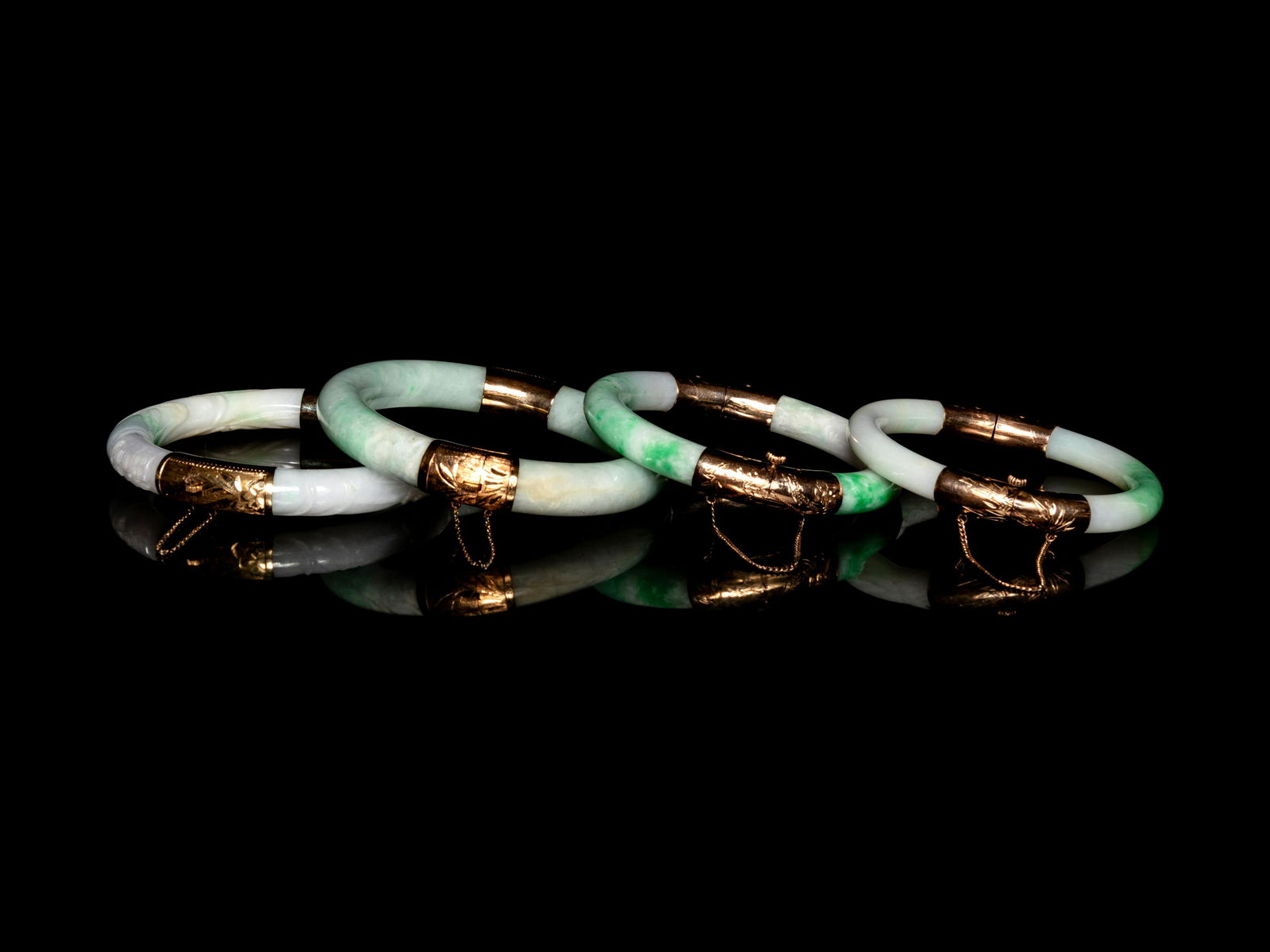 Four Chinese Metal Mounted Jadeite Bangles (1 of 2)