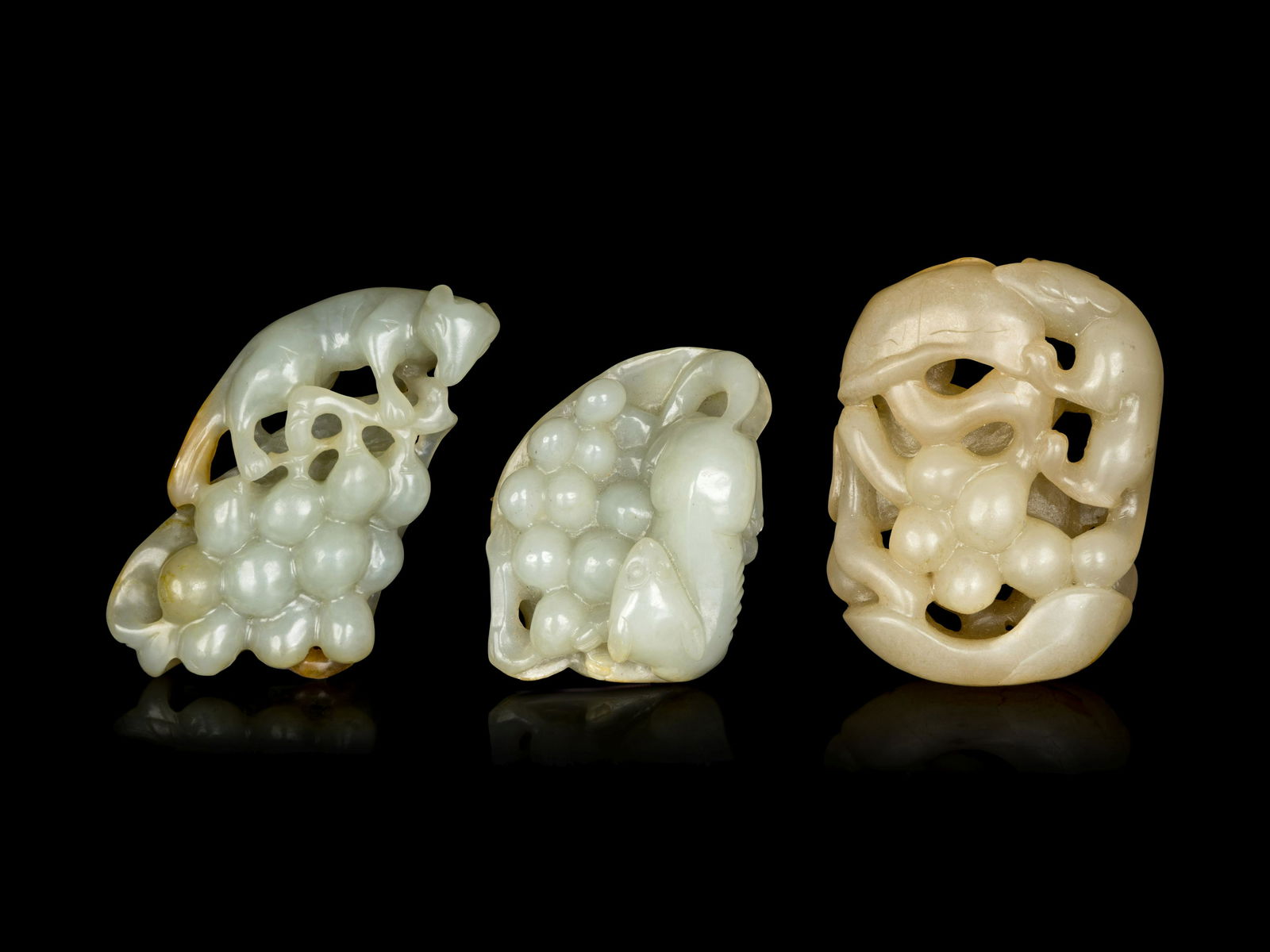 Three Chinese Jade Carvings of 'Squirrel and Grapes' (1 of 2)