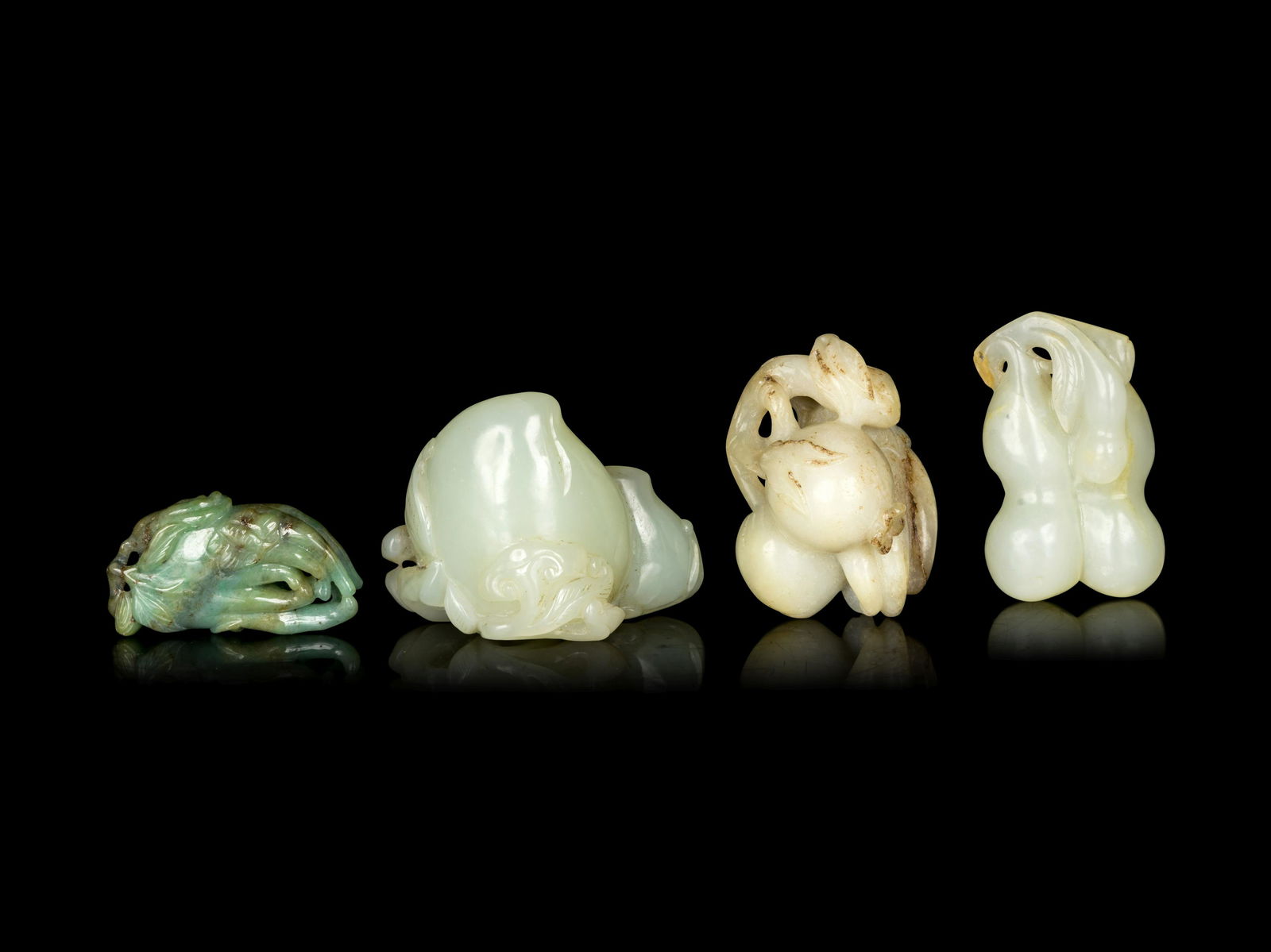 Four Chinese Jade and Jadeite 'Fruit' Carvings (1 of 2)