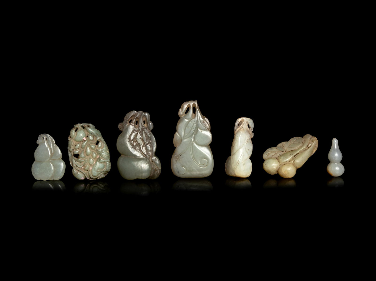 Seven Chinese Celadon Jade Carvings of Double Gourds (1 of 2)