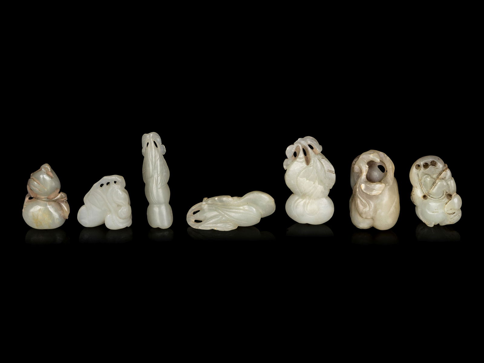 Seven Chinese Celadon Jade Carvings of Double Gourds (1 of 2)