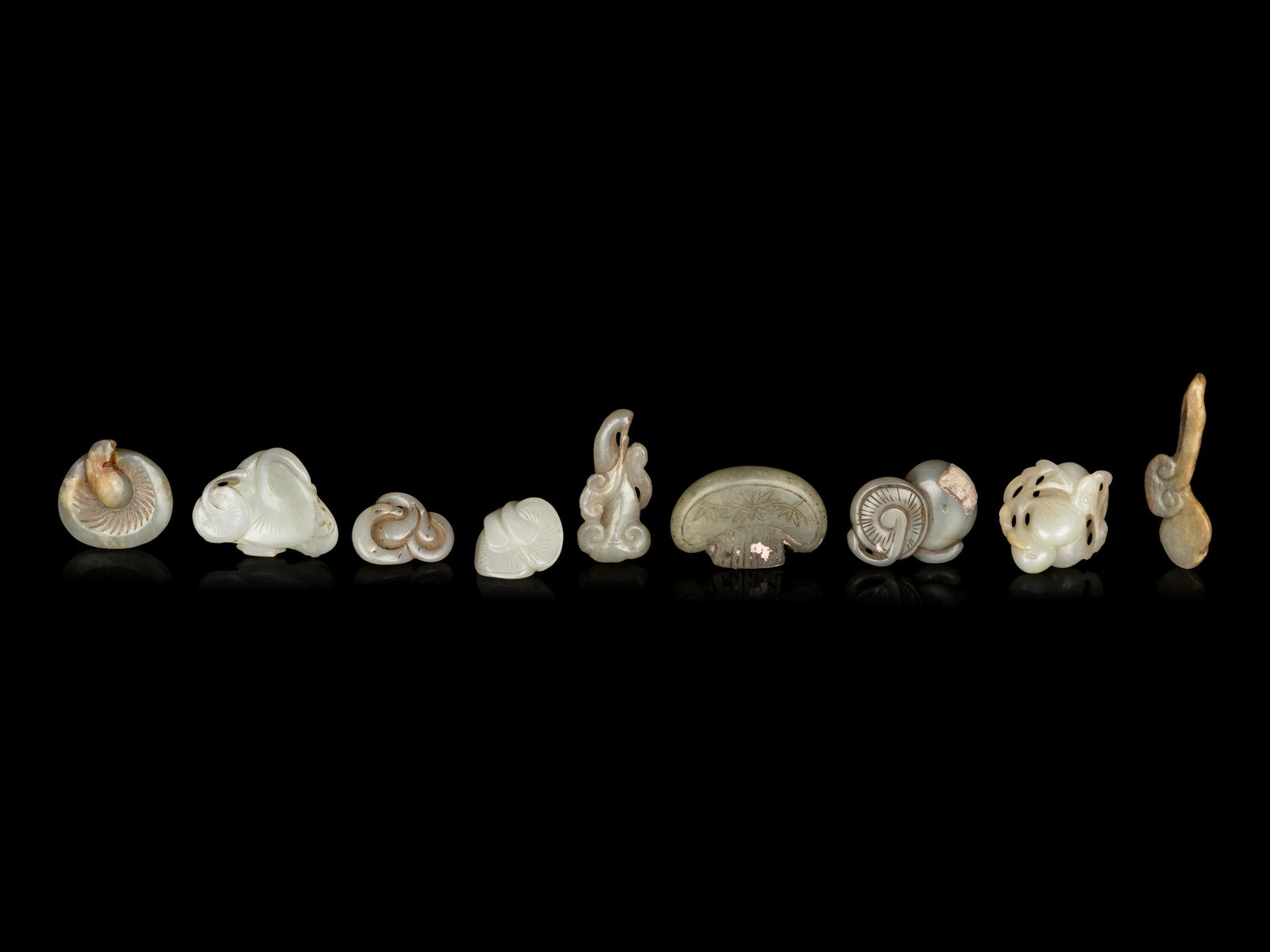 Nine Chinese Celadon Jade 'Fungus' Carvings (1 of 2)