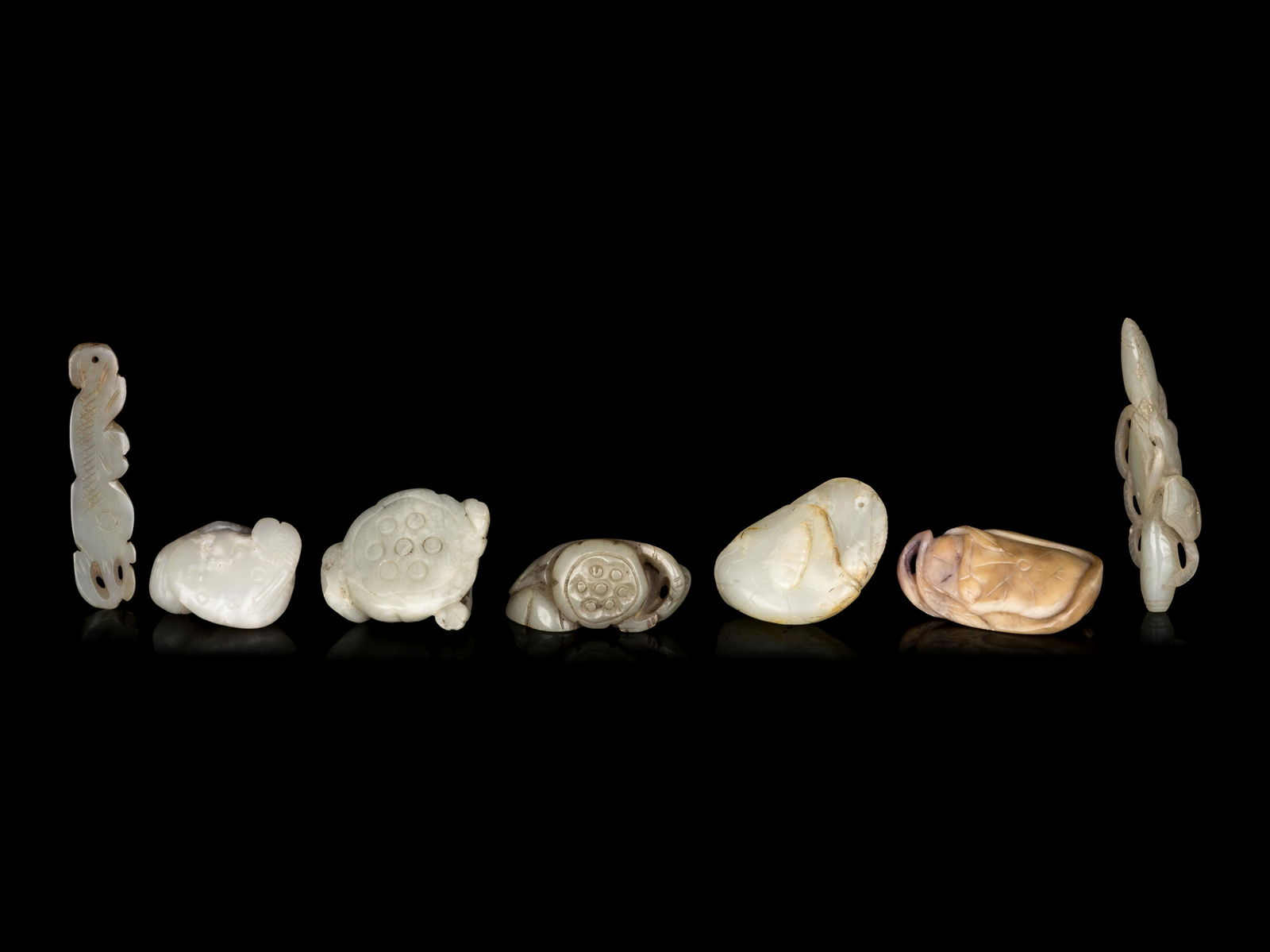 Seven Chinese Celadon Jade 'Lotus' Carvings (1 of 2)