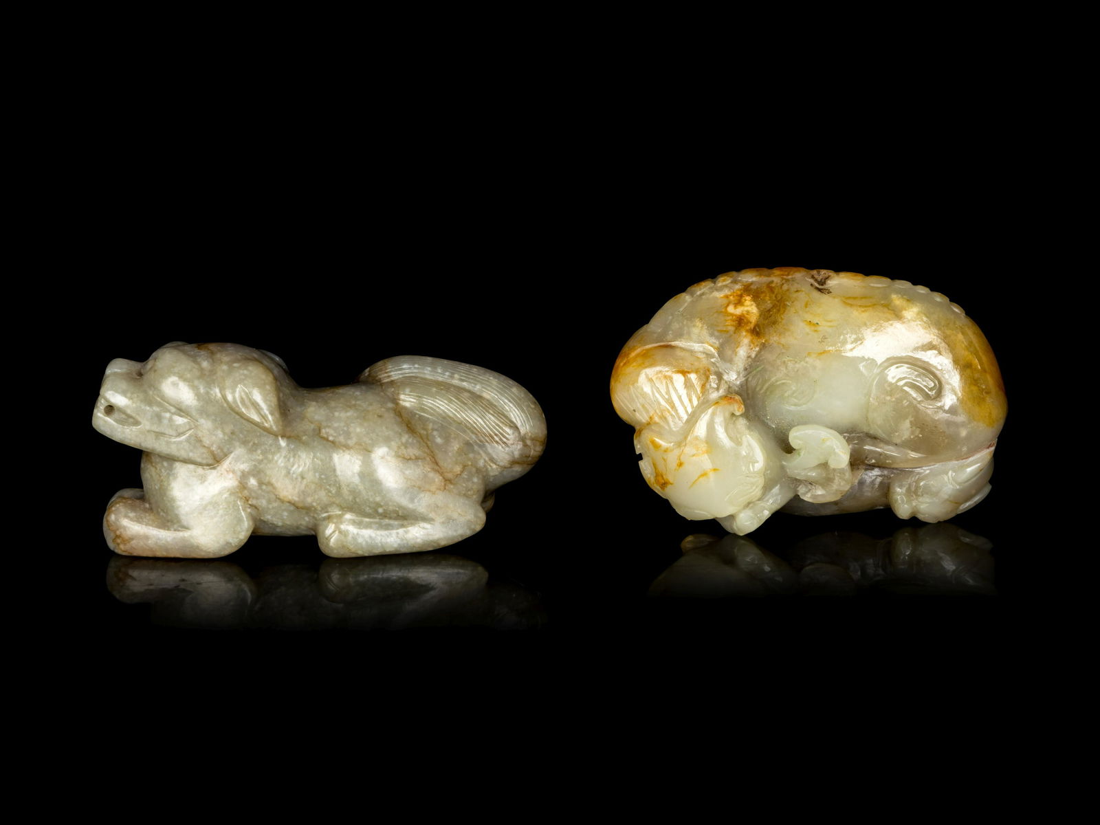 Two Chinese Pale Celadon Jade Figures of Recumbent (1 of 2)
