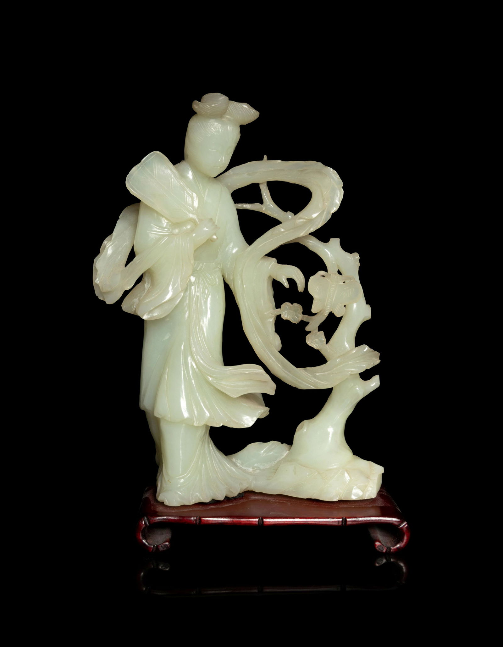 A Chinese Celadon Jade Figure of a Female Immortal (1 of 3)