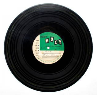 An Original 33 1/3 rpm Acetate of an Elvis Presley: An Original 33 1/3 rpm Acetate of an Elvis Presley Radio Interview, circa 1960, comprising an original recording from "The New KOCY, Oklahoma City" Radio Station, featuring an interview with Elvis