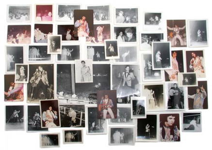 A Group of Fifty Photographs of Elvis Presley in C: A Group of Fifty Photographs of Elvis Presley in Concert, comprising 24 photographs of Elvis at an April 3, 1957, concert in Ottawa, Canada, wearing a gold lame jacket, 13 color photographs from the