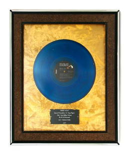 A Framed Presentation LP Album of Moody Blue," Elv: A Framed Presentation LP Album of "Moody Blue," Elvis Presley's Last Album, R&T Productions, 1977 AFL1-2428, framed with a descriptive plaque indicating a special presentation to Gary Pepper,