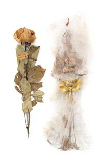 Two White Roses and Other Items from Elvis Presley: Two White Roses and Other Items from Elvis Presley's Funeral, comprising two white roses from a spray Priscilla Presley placed on top of the Elvis Presley's casket, an original photograph of Elvis
