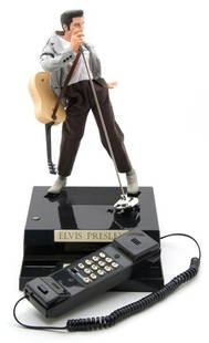 An NIB Telemania Elvis Presley Singing Dancing Tel: An NIB Telemania Elvis Presley Singing Dancing Telephone, in original box.