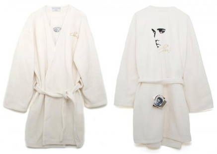 A White Fleece Elvis Presley Robe,: A White Fleece Elvis Presley Robe, with tag reading "Dakotah Luxe."