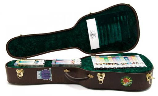 An Elvis Presley MGM Commemorative Film Collection: An Elvis Presley MGM Commemorative Film Collection in Deluxe Guitar Case, containing all 18 MGM Elvis Presley films, unwrapped, in original full size leatherette guitar case. Limited edition, number