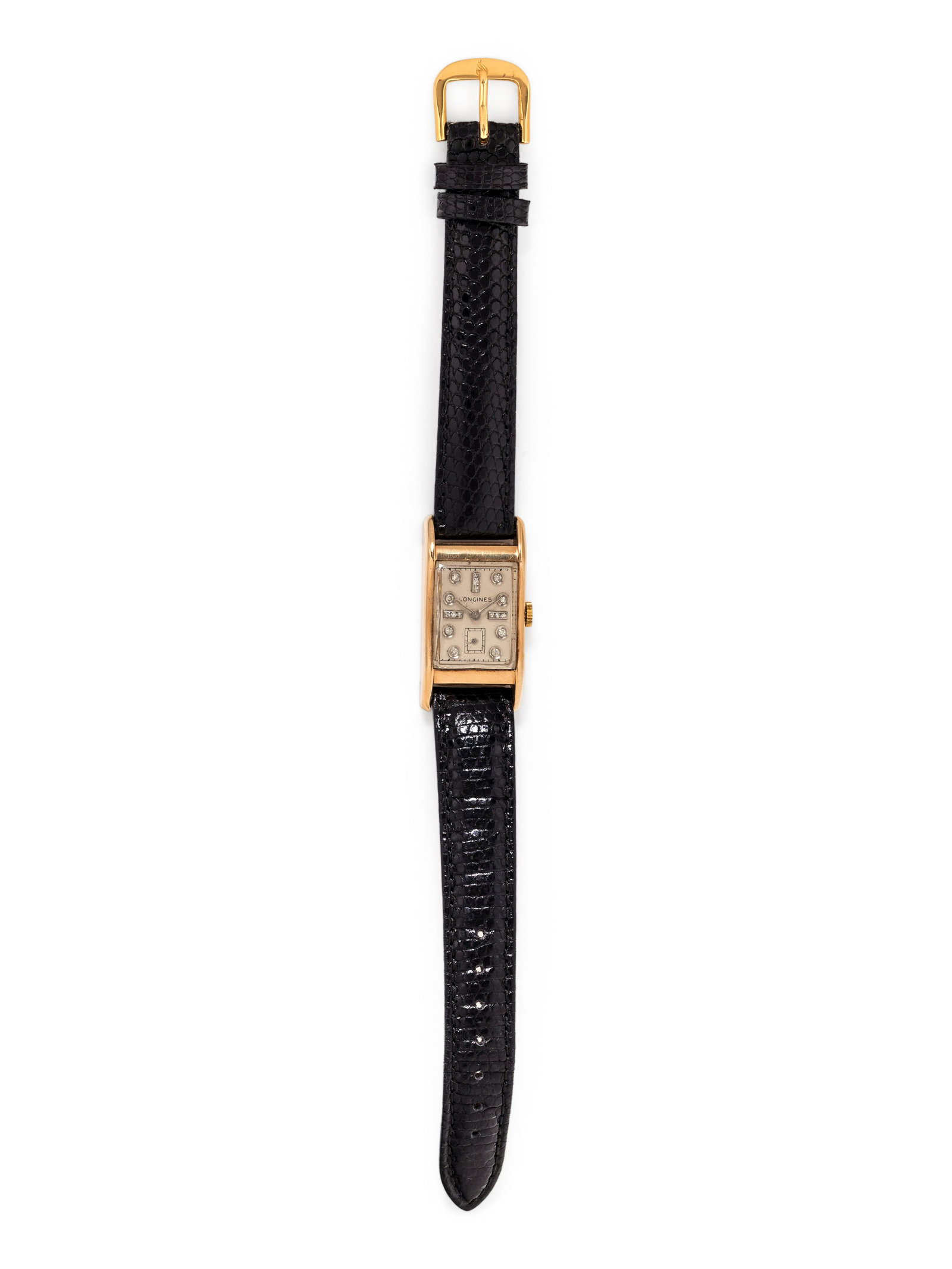 LONGINES, 14K YELLOW GOLD AND DIAMOND WRISTWATCH: LONGINES, 14K YELLOW GOLD AND DIAMOND WRISTWATCH 39.00 x 20.00 mm case dimensions inclusive of lugs, matte silvered dial, single cut diamond numerals, subdial for seconds at 6 o'clock, Cal. 9L 17 jewe