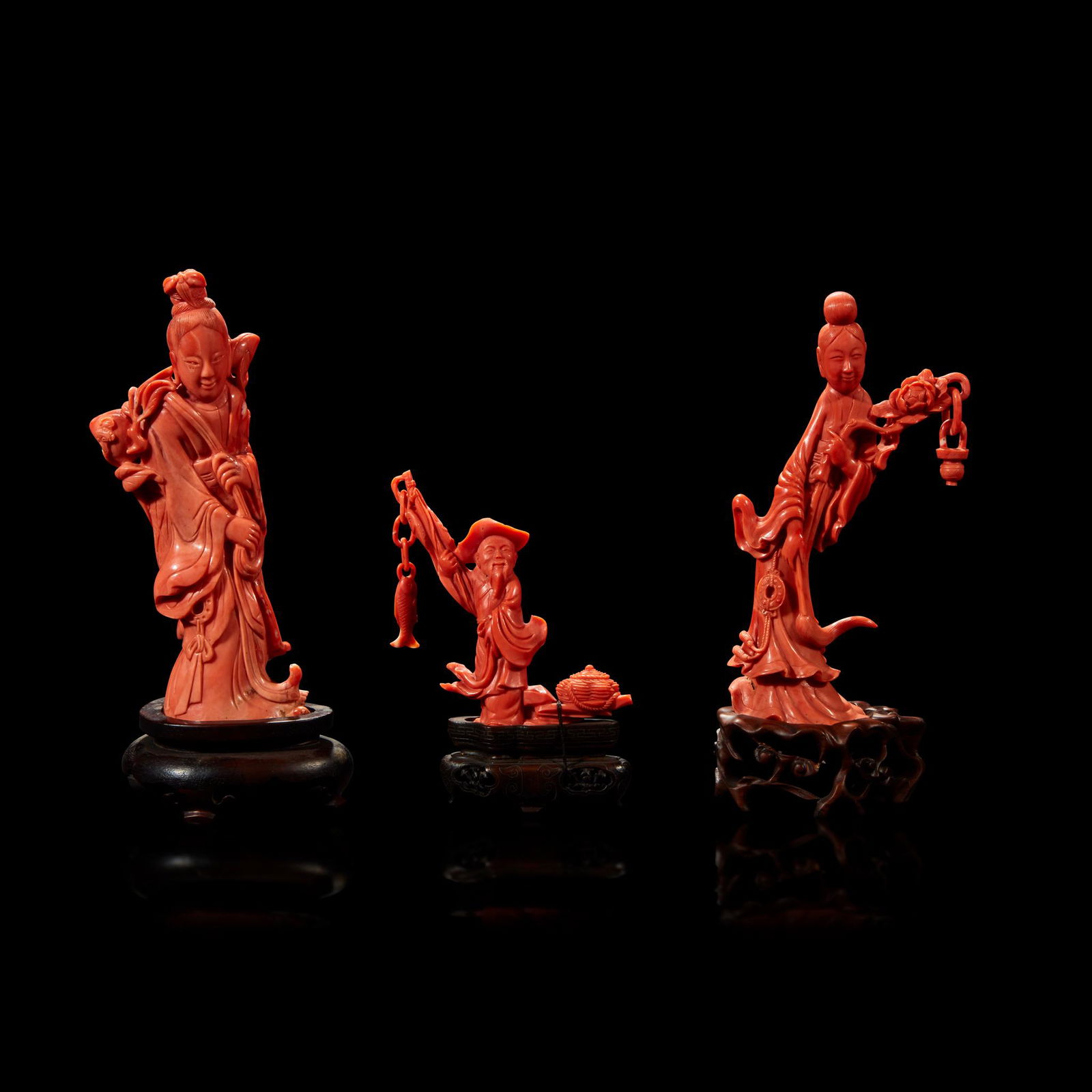 Three Chinese carved coral figural groups (1 of 2)
