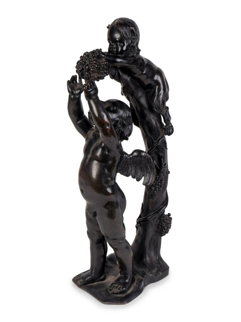 A Continental Patinated Bronze Group of Cupid and an (1 of 3)