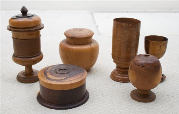 A Collection of Six Turned Wood Articles, Height of: A Collection of Six Turned Wood Articles, comprised of yew wood handles and others. Height of tallest 7 1/2 inches. Property from the Estate of Mr. Gerald Arpino, Chicago, Illinois