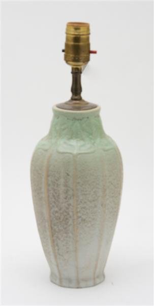 A Van Briggle Pottery Vase, Height 10 inches.: A Van Briggle Pottery Vase, of baluster form, having faceted sides, mounted as a lamp. Height 10 inches.