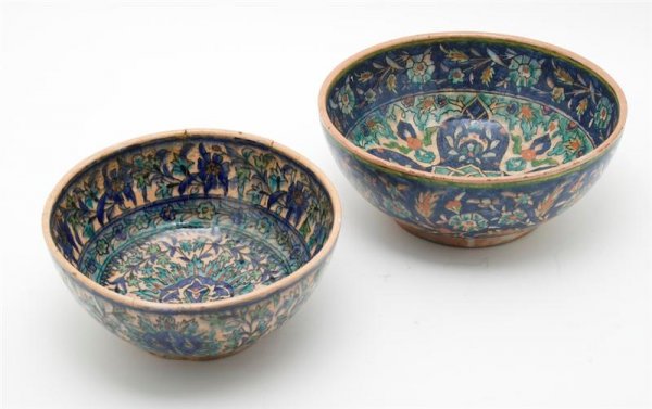 A Group of Two Iznik Style Pottery Bowls, Diameter: A Group of Two Iznik Style Pottery Bowls, having polychrome stylized foliate decoration to interior and exterior. Diameter of widest 11 inches. Property from the Estate of Leon and Marian Despres, Chi
