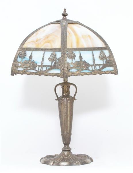 An American Slag Glass Lamp, Height 23 1/2 inches.: An American Slag Glass Lamp, having landscape metal overlays. Height 23 1/2 inches. Property from the Estate of Arthur Charles Jones, Elmhurst, Illinois