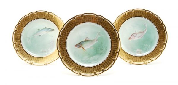 A Set of Nine English Fish Plates, Minton, Diamete: A Set of Nine English Fish Plates, Minton, each signed A.H. Wright, the various species of fish depicted in an aquatic setting. Diameter 9 1/8 inches.