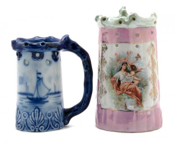 A Group of Two Puzzle Mugs, Height of tallest 6 3/: A Group of Two Puzzle Mugs, one lustreware example with portrait, the other a German example with boating scene. Height of tallest 6 3/4 inches.
