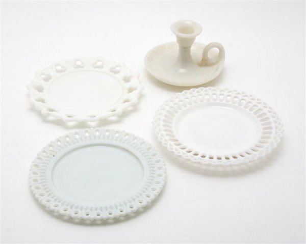 A Collection of Milk Glass Articles, Height of tal: A Collection of Milk Glass Articles, comprising 10 dishes in various patterns, a tray, 2 covered boxes, a chamber stick, 5 tumblers, a bird formed vessel, a covered sugar and a toothpick holder. Heigh