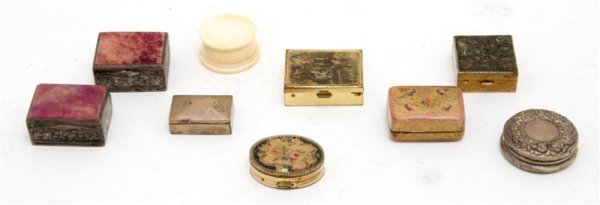 A Collection of Nine Pill Boxes, Width of widest 1: A Collection of Nine Pill Boxes, of various forms and decoration, including some silver examples. Width of widest 1 1/2 inches. Property from the Estate of Nancy S. Blakeslee, Barrington, Illinois