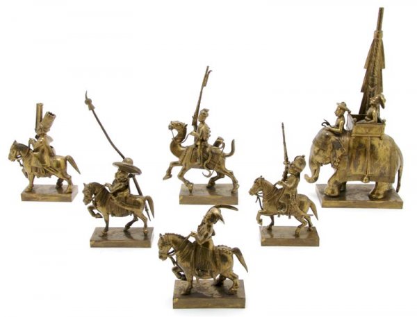 A Group of Southeast Asian Brass Figures, Height o: A Group of Southeast Asian Brass Figures, each depicting figures mounted on various animals including horses, camels and elephants; 7 figures total. Height of tallest 9 5/8 inches.