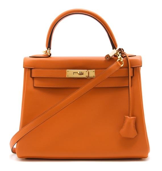 An Hermes Orange Leather Kelly, 28 x 22 x 11 cm (1