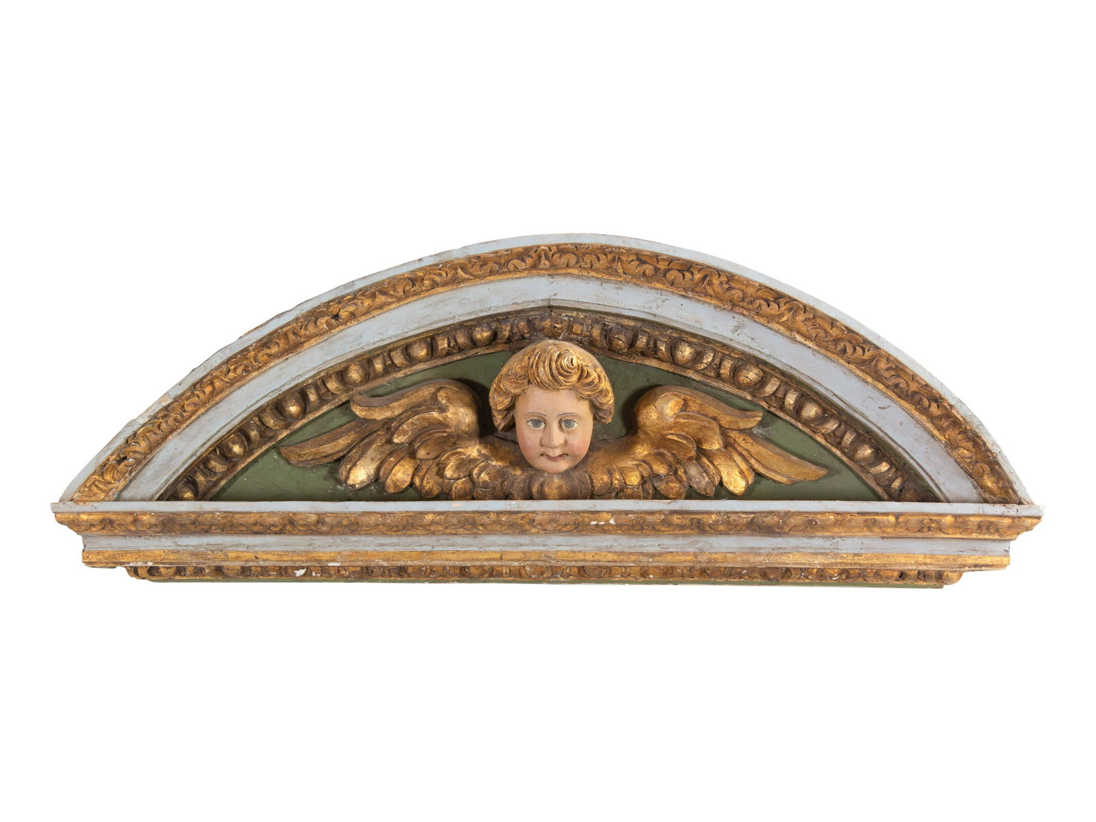 A Baroque Painted and Parcel Gilt Transom Ornament: A Baroque Painted and Parcel Gilt Transom Ornament 18th Century Height 20 1/2 x width 55 x depth 8 inches. Patricia Ann Black Smyth (1925-2018) was born in Kansas City, Missouri, the daughter of