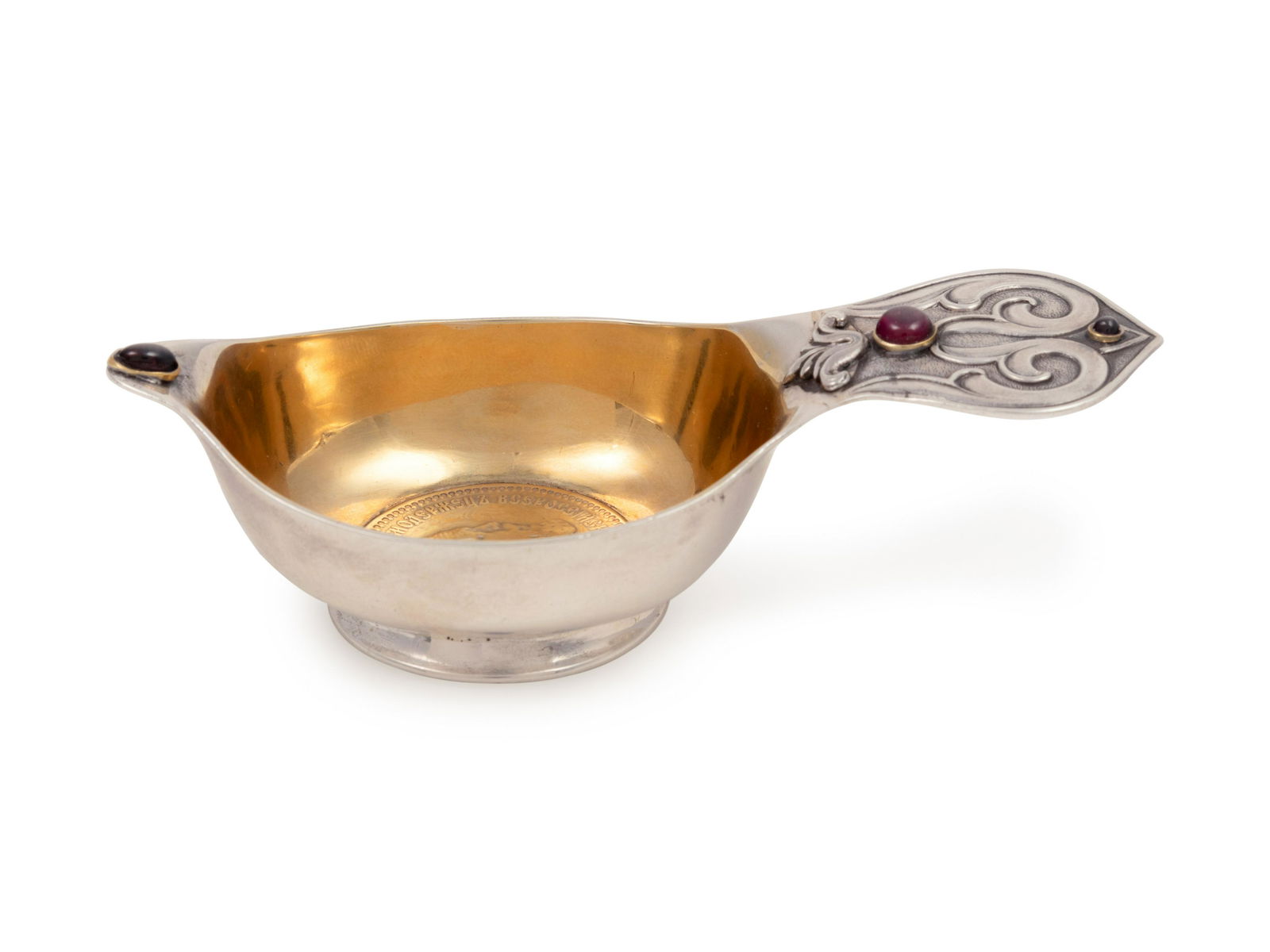 A Russian Silver Coin-Inset Kovsh: A Russian Silver Coin-Inset Kovsh Mark of Grachev Brothers with the Imperial Warrant, St. Petersburg, Circa 1900 marked with '84' standard on side of body 1 ozt 7 dwt (52.89 g) Height 1 1/8 x width 3