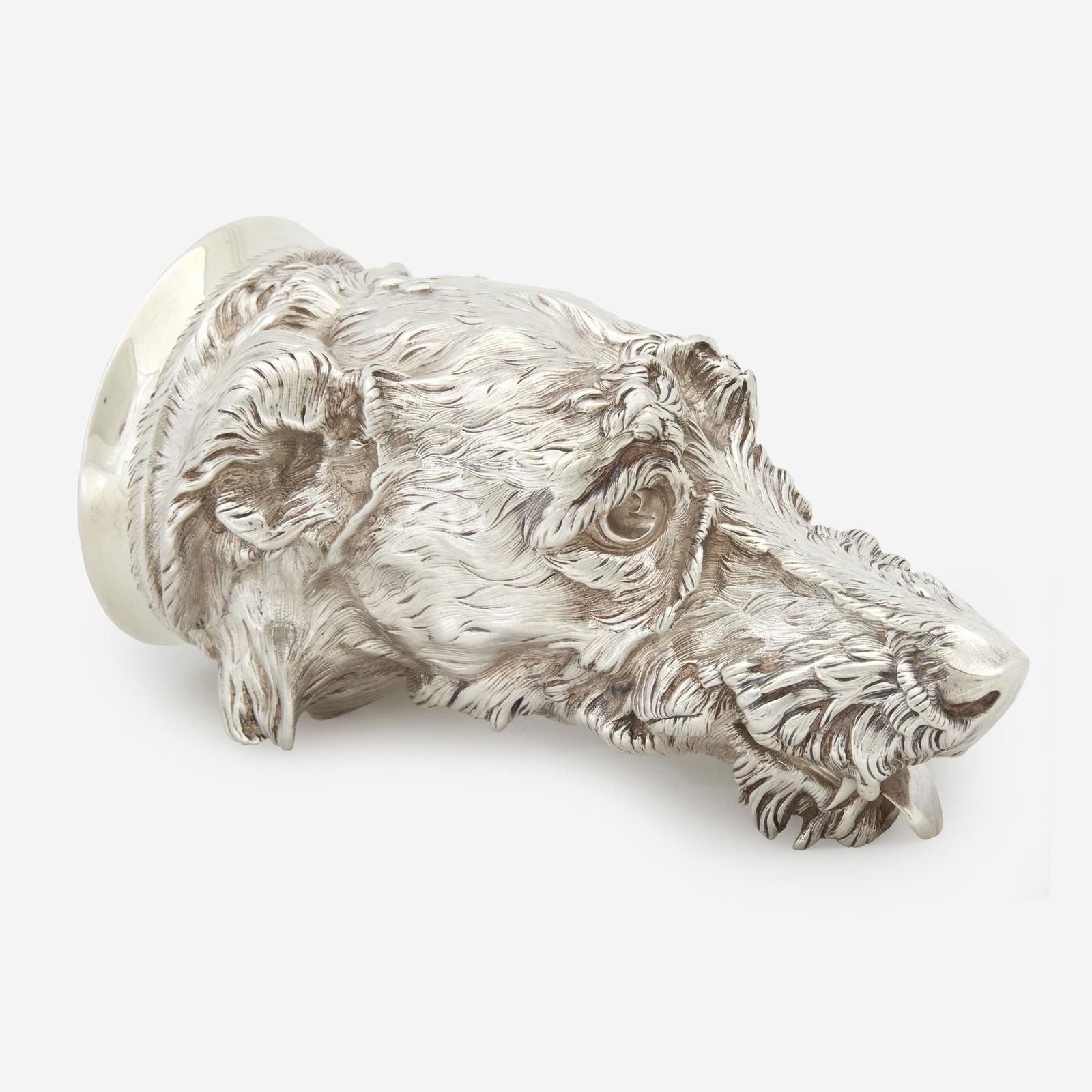 A Victorian sterling silver otter hound-form stirrup: A Victorian sterling silver otter hound-form stirrup cup James Barclay Hennell, London, 1878 Marked. (L: 6 1/2 in., Weight: 15 oz. t.) Provenance
