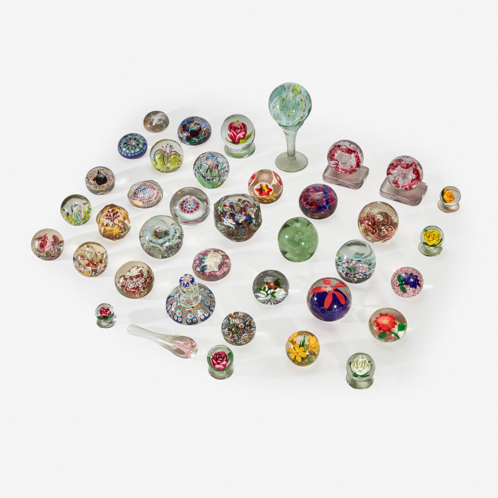 A collection of assorted glass paperweights Millville, (1 of 1)