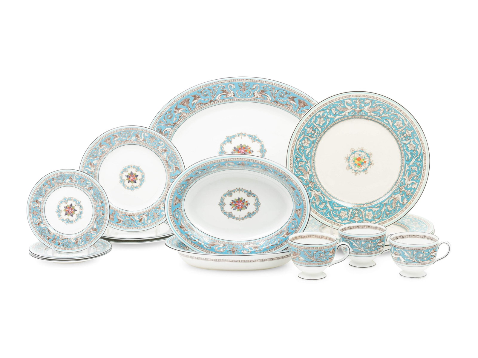 A Wedgwood Florentine Porcelain Dinner Service: A Wedgwood Florentine Porcelain Dinner Service 20th Century comprising: 14 dinner plates 14 luncheon plates 12 bread plates 14 teacups 15 saucers 2 oval serving bowls 1 platter together with 4 similar
