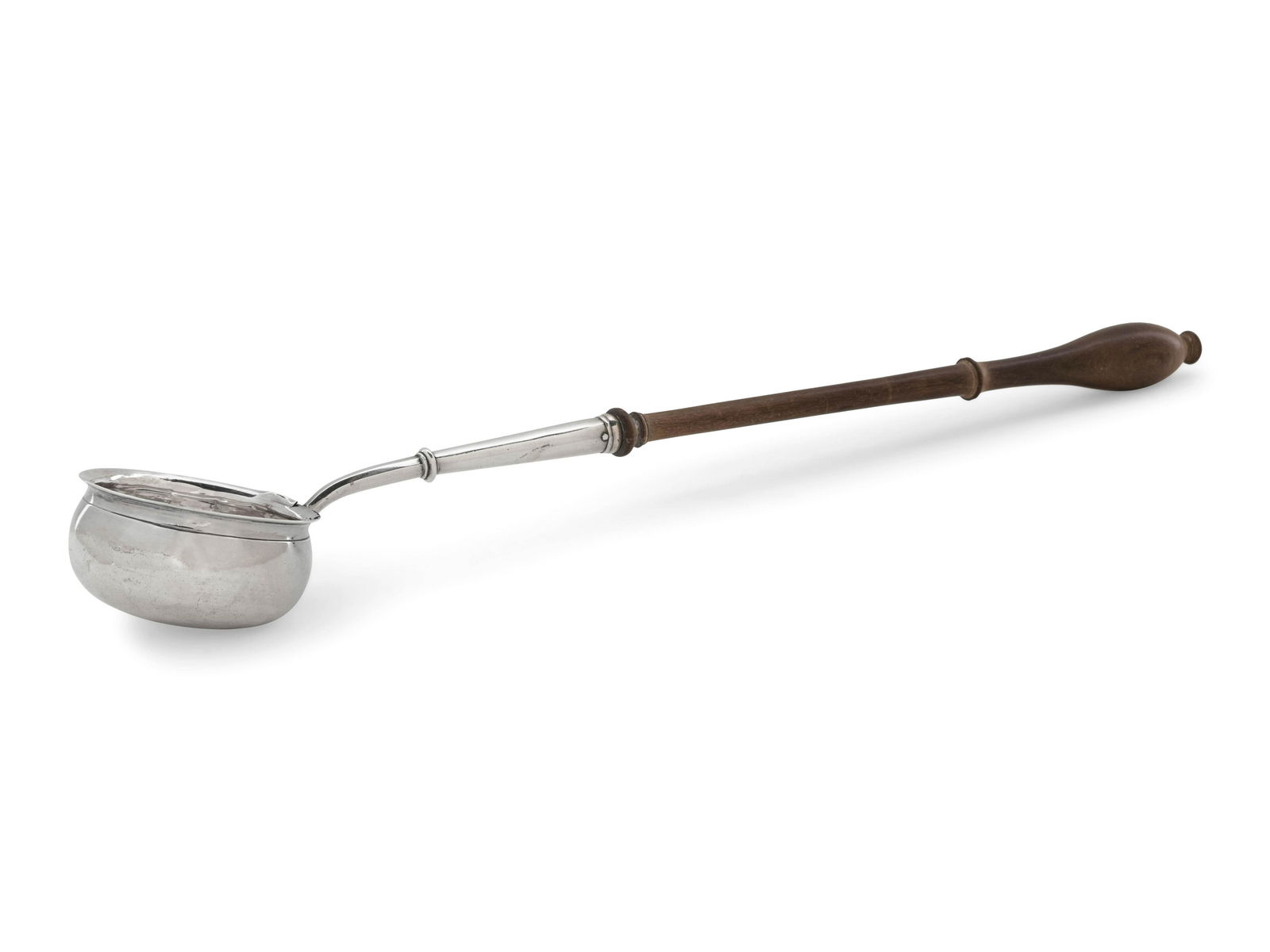 A George II Silver Toddy Ladle: A George II Silver Toddy Ladle John Gamon, London, 1735 with a wooden handle. Length 14 3/4 inches. Property from the Collection of Mary Southworth, Lake Forest, Illinois