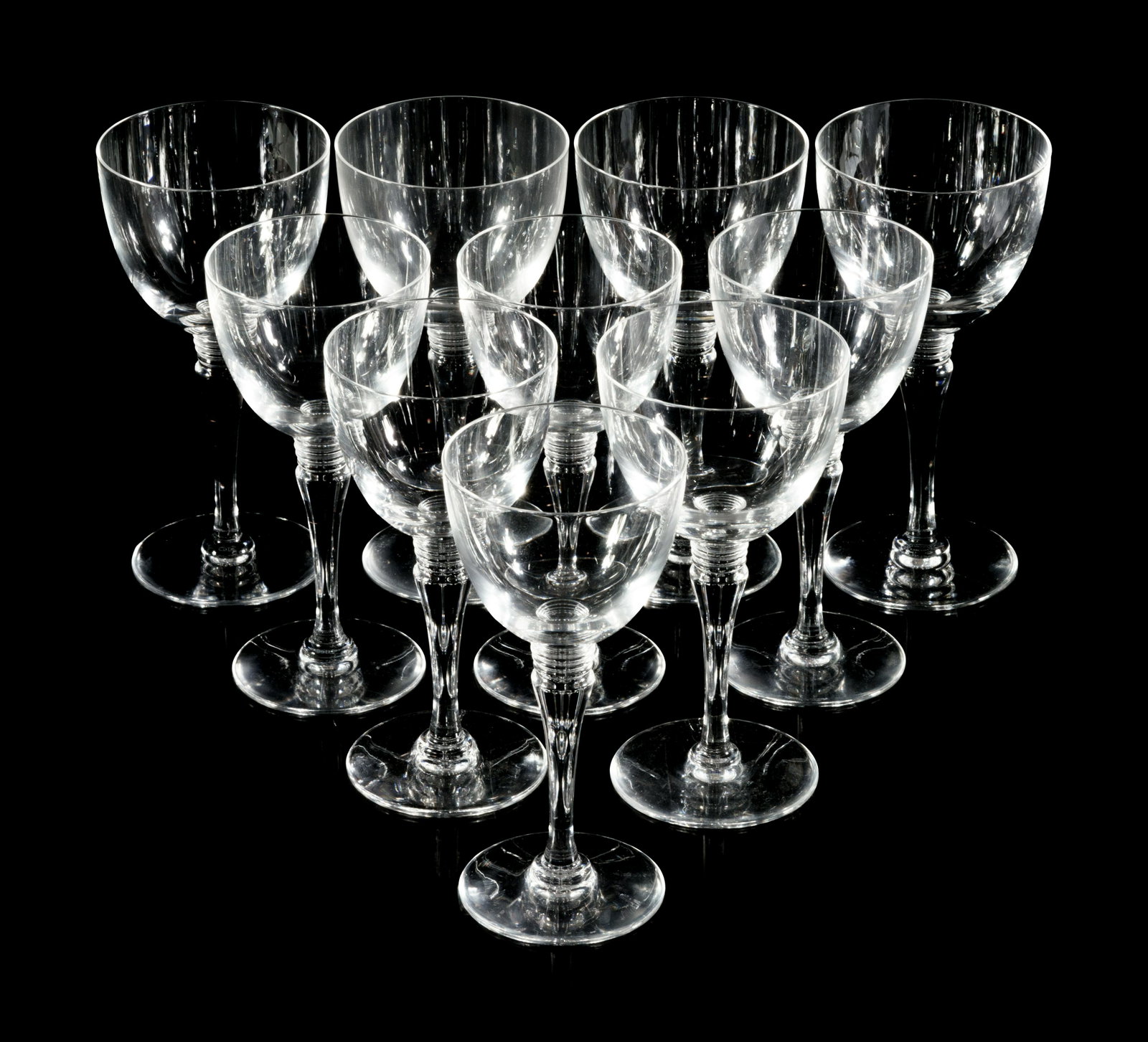 A Set of Saint-Louis Glass Stemware: A Set of Saint-Louis Glass Stemware France, 20th Century comprising 24 wine glasses and 13 water goblets; 37 items total. Height of water goblets 7 1/4 inches. Property from a Private Collection