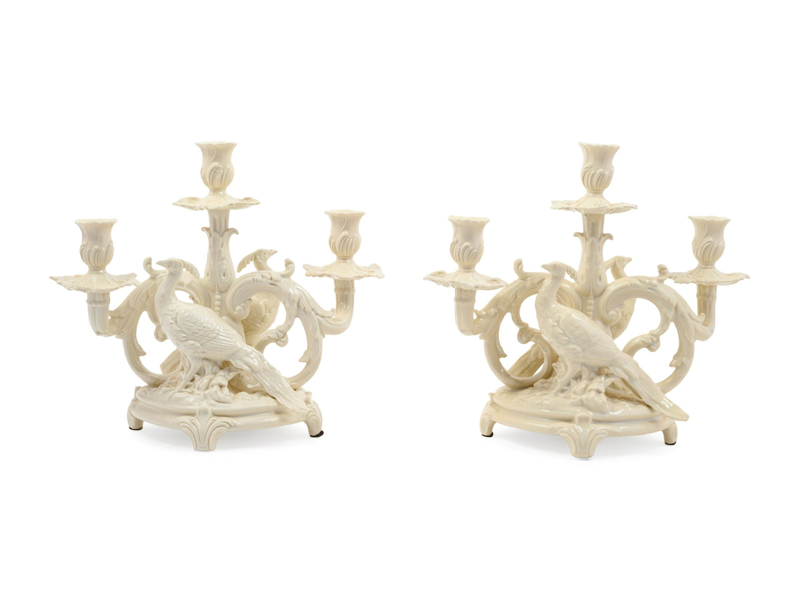 A Pair of German White Glazed Porcelain Candelabra: A Pair of German White Glazed Porcelain Candelabra 20th Century Height 10 inches.