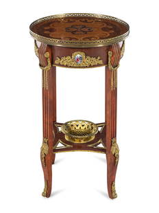 A Gilt Metal Mounted Side Table in the Manner of Adam: A Gilt Metal Mounted Side Table in the Manner of Adam Weisweiler 20th Century Height 31 x diameter of top 18 inches. Property from The Estate of Edwin William Young, Smithville, Tennessee