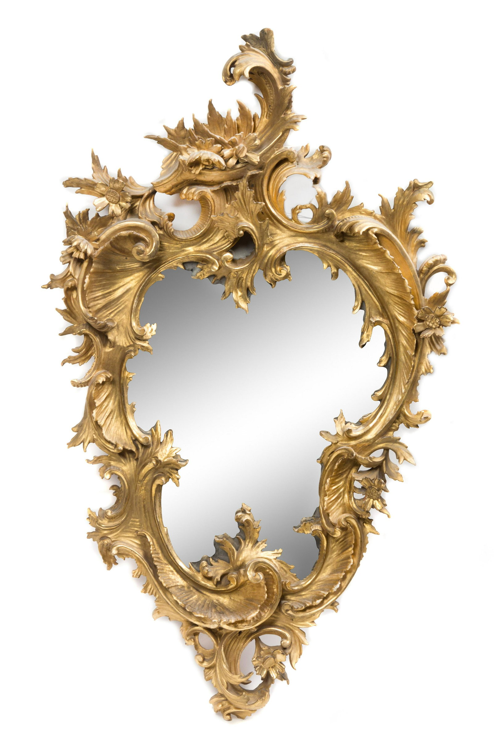 A Rococo Style Giltwood Mirror: A Rococo Style Giltwood Mirror Late 19th/Early 20th Century Height 32 1/2 x width 19 3/4 inches.