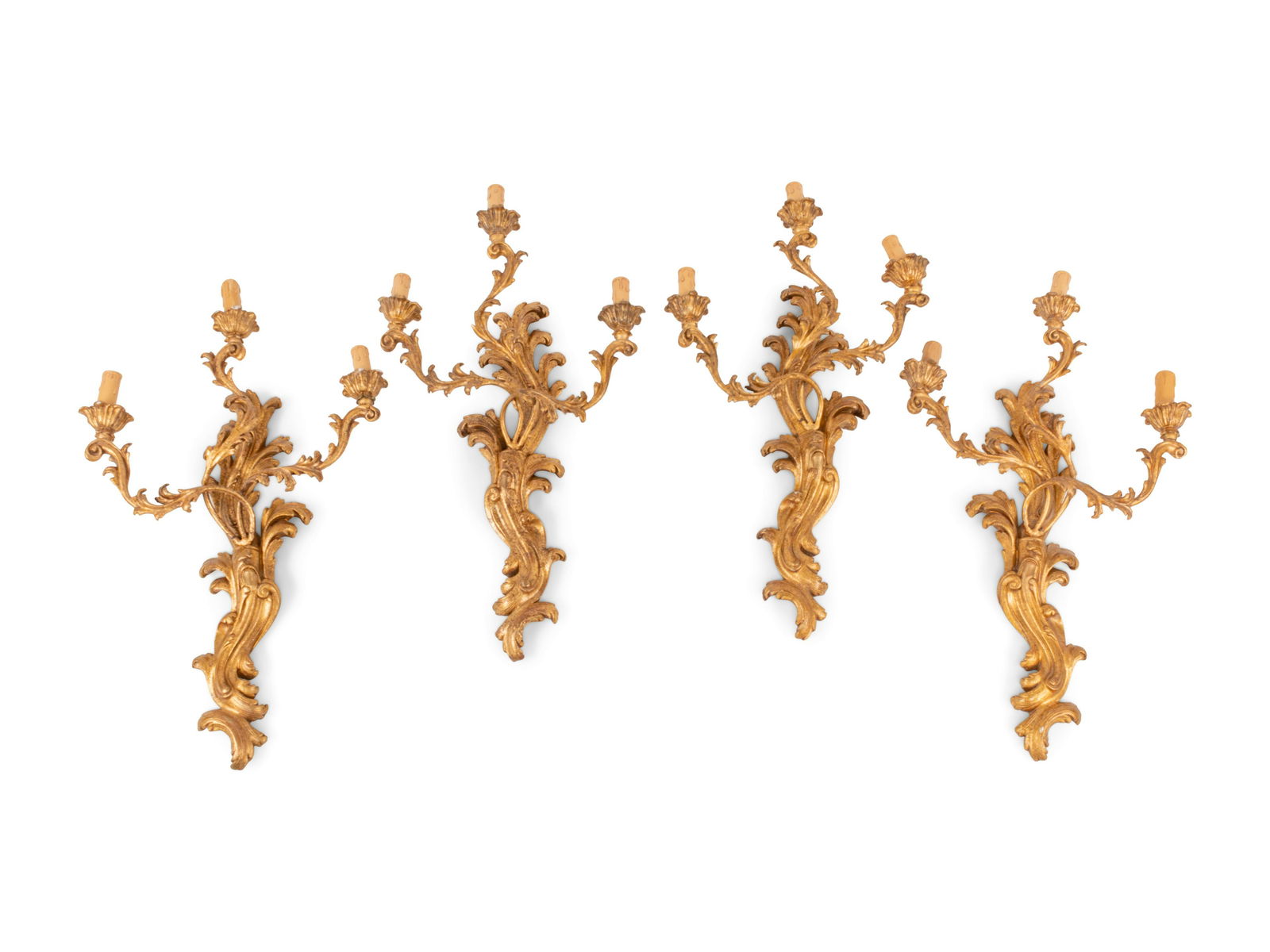 A Set of Four Italian Carved Giltwood Three-Light (1 of 3)