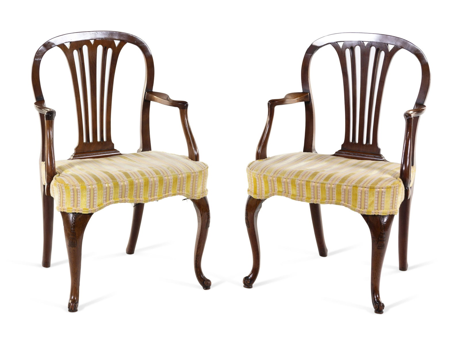 A Pair of George III Tassel-Carved Mahogany Scroll-Foot: A Pair of George III Tassel-Carved Mahogany Scroll-Foot Armchairs Circa 1770 Height 36 x width 24 x depth 22 inches. Provenance: Stair & Co., New York, 6 May 1980 (with invoice) Property from the Esta