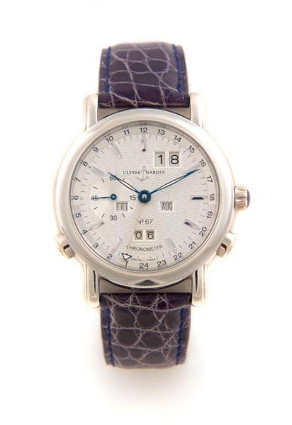 An 18 Karat White Gold Automatic Perpetual Calendar: An 18 Karat White Gold Automatic Perpetual Calendar Ludwig GMT Wristwatch, Ulysse Nardin, limited edition of 500, reference number 329-80, 34 jewel movement, silvered dial with raised batons, blued st