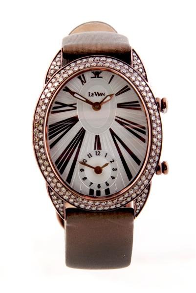 A Stainless Steel and Brown Diamond St. Tropez Wris: A Stainless Steel and Brown Diamond St. Tropez Wristwatch, Le Vian, silvered dial, Roman numeral, subdial for second time zone, oval case containing numerous round brilliant cut brown diamonds, brown 