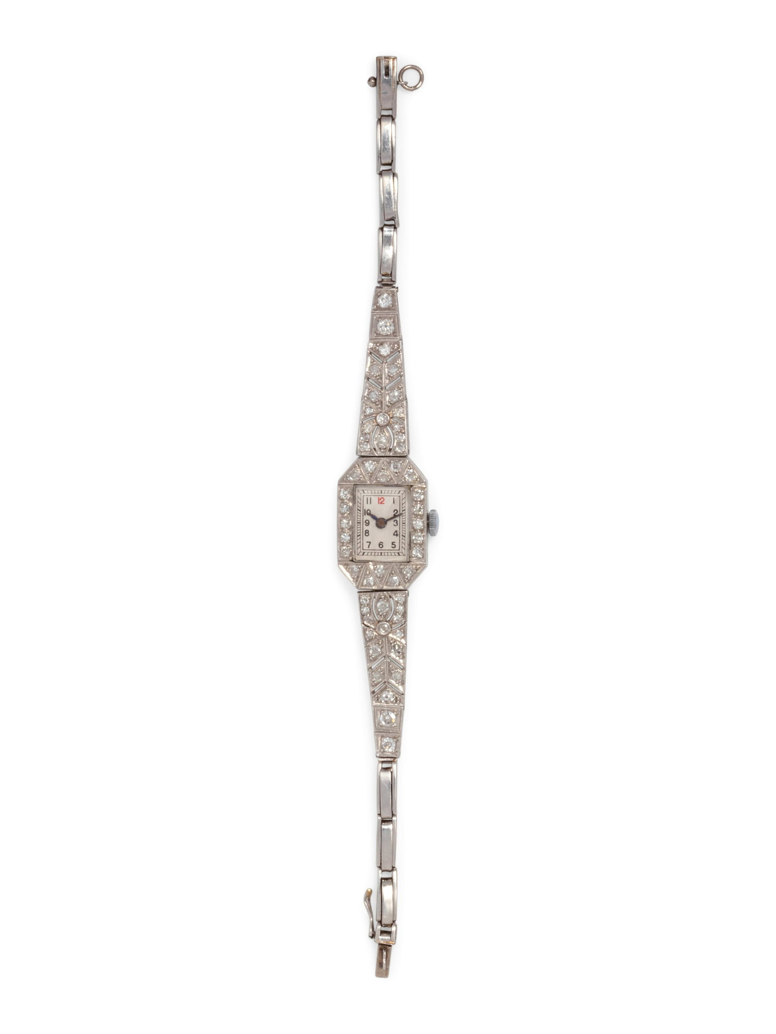 PLATINUM AND DIAMOND WRISTWATCH: PLATINUM AND DIAMOND WRISTWATCH 21.00 x 14.00 mm case dimensions, the bezel and bracelet containing numerous single cut diamonds, matte silvered dial, black Arabic numerals, 17 jewel manual wind movem