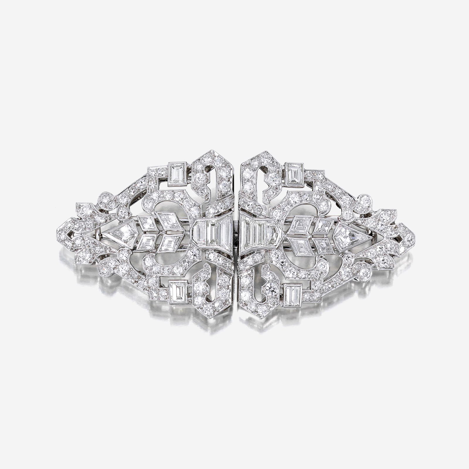 An Art Deco diamond and platinum clip/brooch (1 of 2)