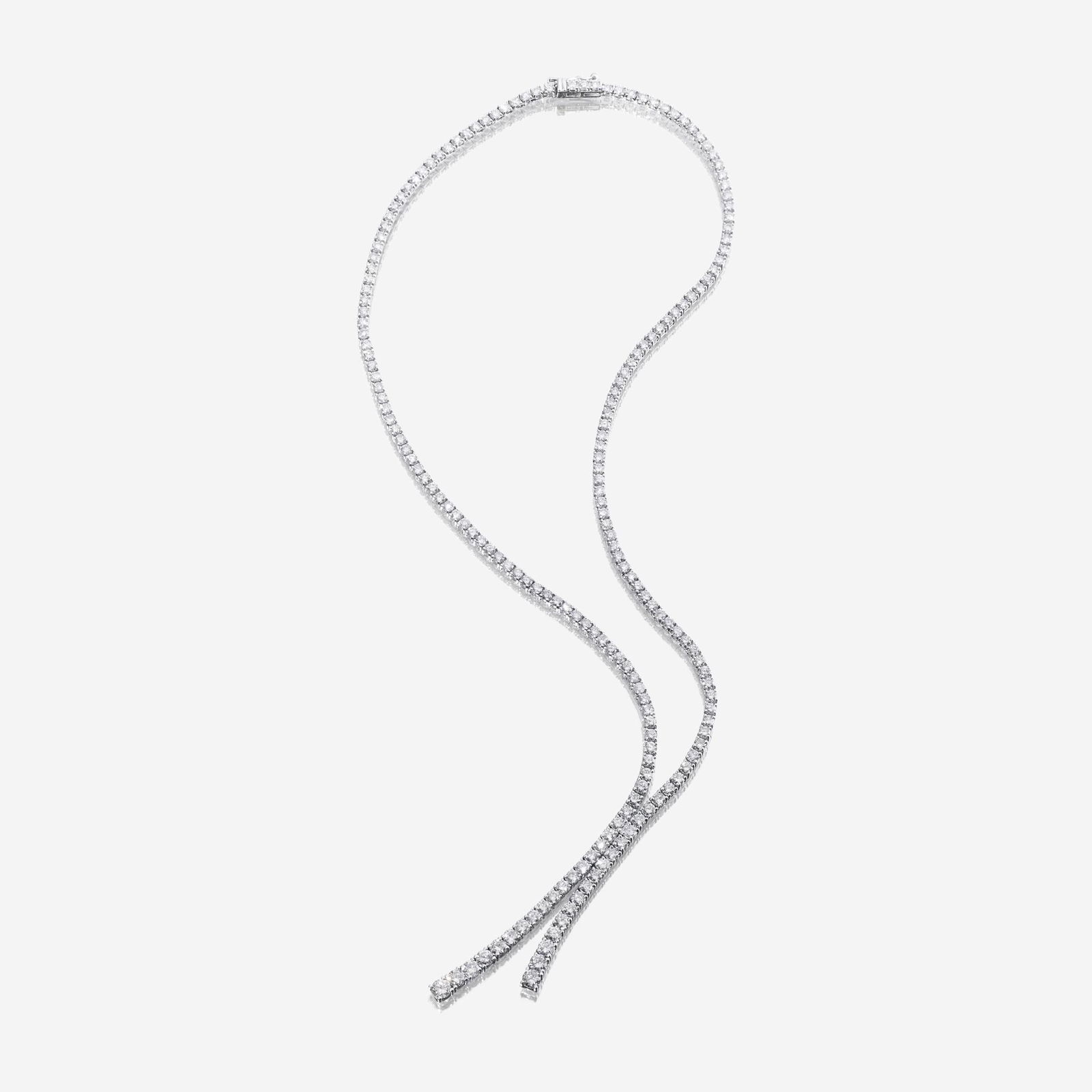 A diamond and eighteen karat white gold lariat necklace (1 of 1)