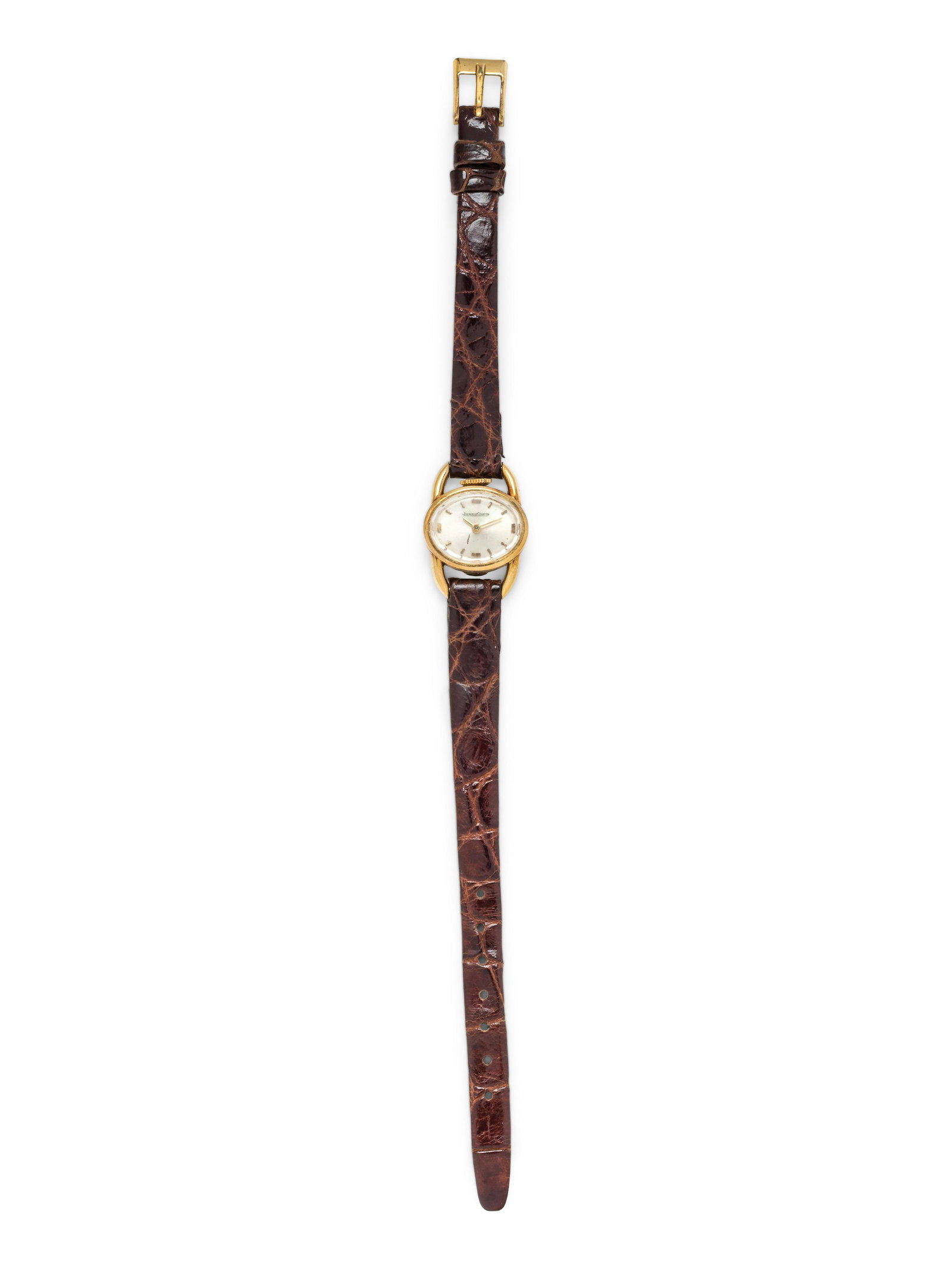 JAEGER-LeCOULTRE, 18K YELLOW GOLD WRISTWATCH: JAEGER-LeCOULTRE, 18K YELLOW GOLD WRISTWATCH 15.00 x 19.00 mm case dimensions exclusive of lugs, matte silvered dial, applied gold baton numerals, jeweled manual wind movement signed JAEGER-LECOULTRE 
